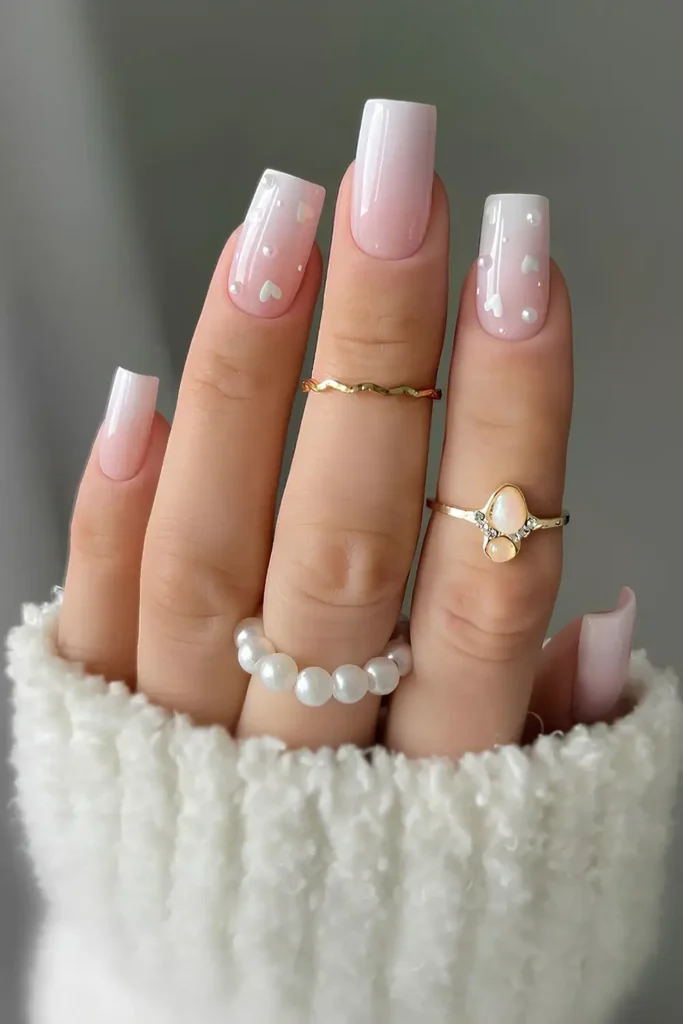 White ombre manicure adorned with tiny pearls and hearts. by amanda.sudolll
