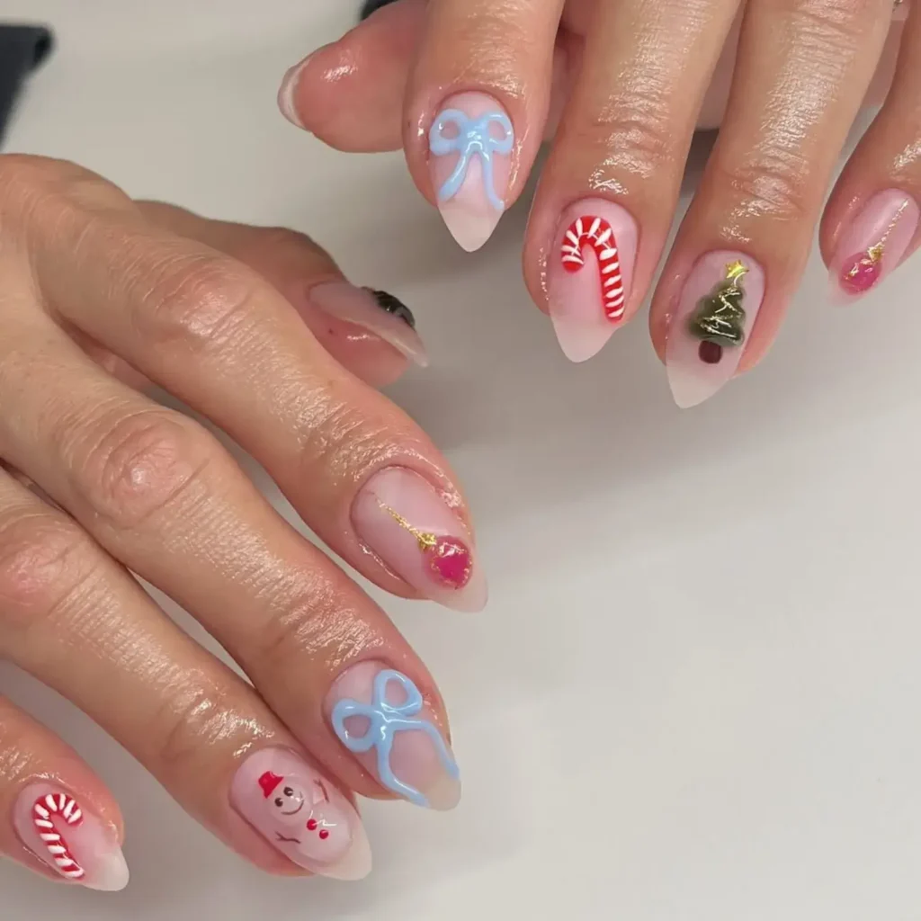 Dainty candy canes and trees on neutral almond nails. by karin.nailedit