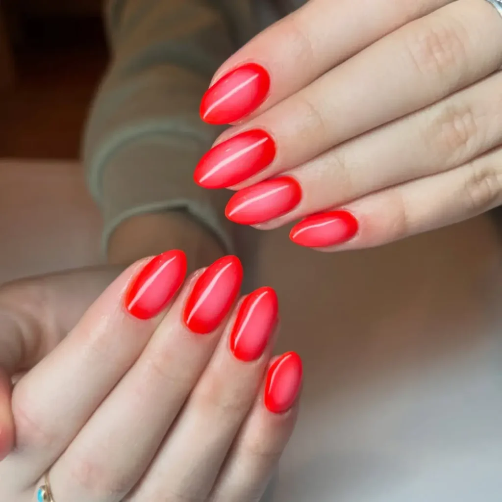 Red and white aura fade with a frosted look. by nailsbybrinley